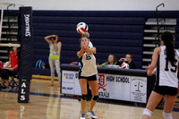 Caitlyn Stouts sets the ball for the frontline